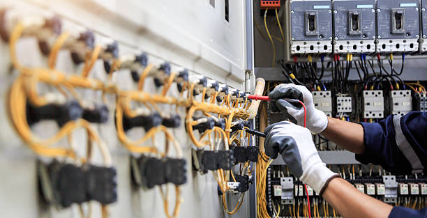 Professional Electrician technician working in Progress Village, FL